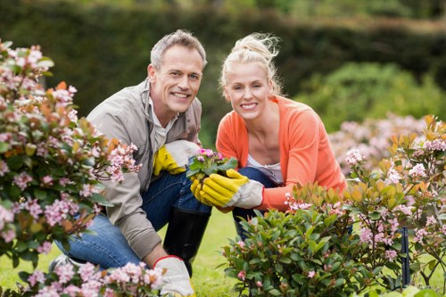 Supervisor providing training to gardening staff